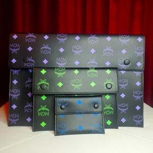 MCM leather pouch set NEW